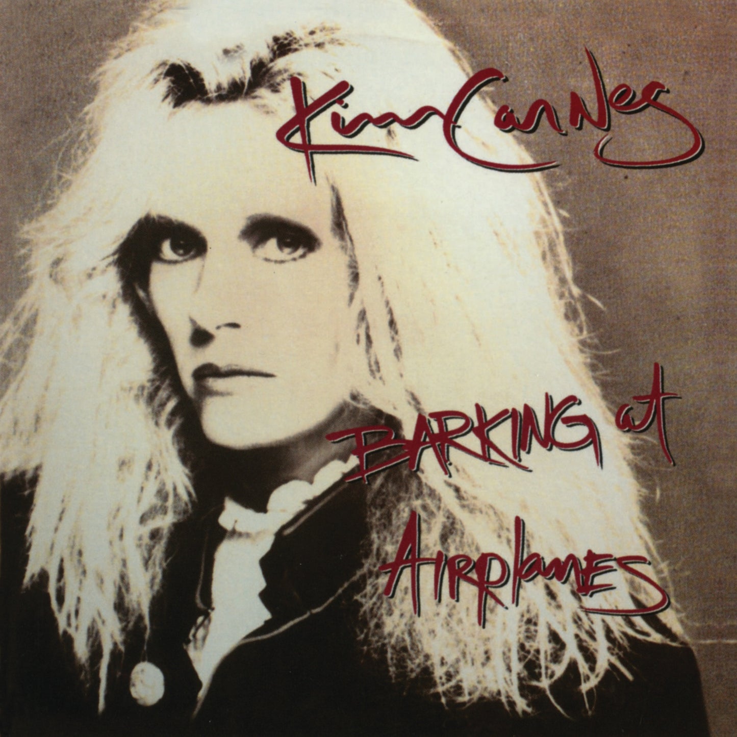 Kim Carnes - Barking At Airplanes (Bonus Tracks) Album Cover