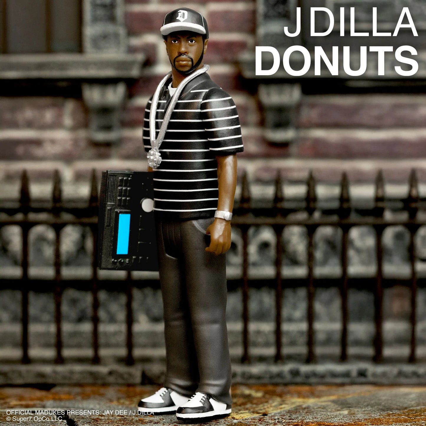 ReAction Figures Wave 1 J Dilla (Donuts - Smile Album Cover)